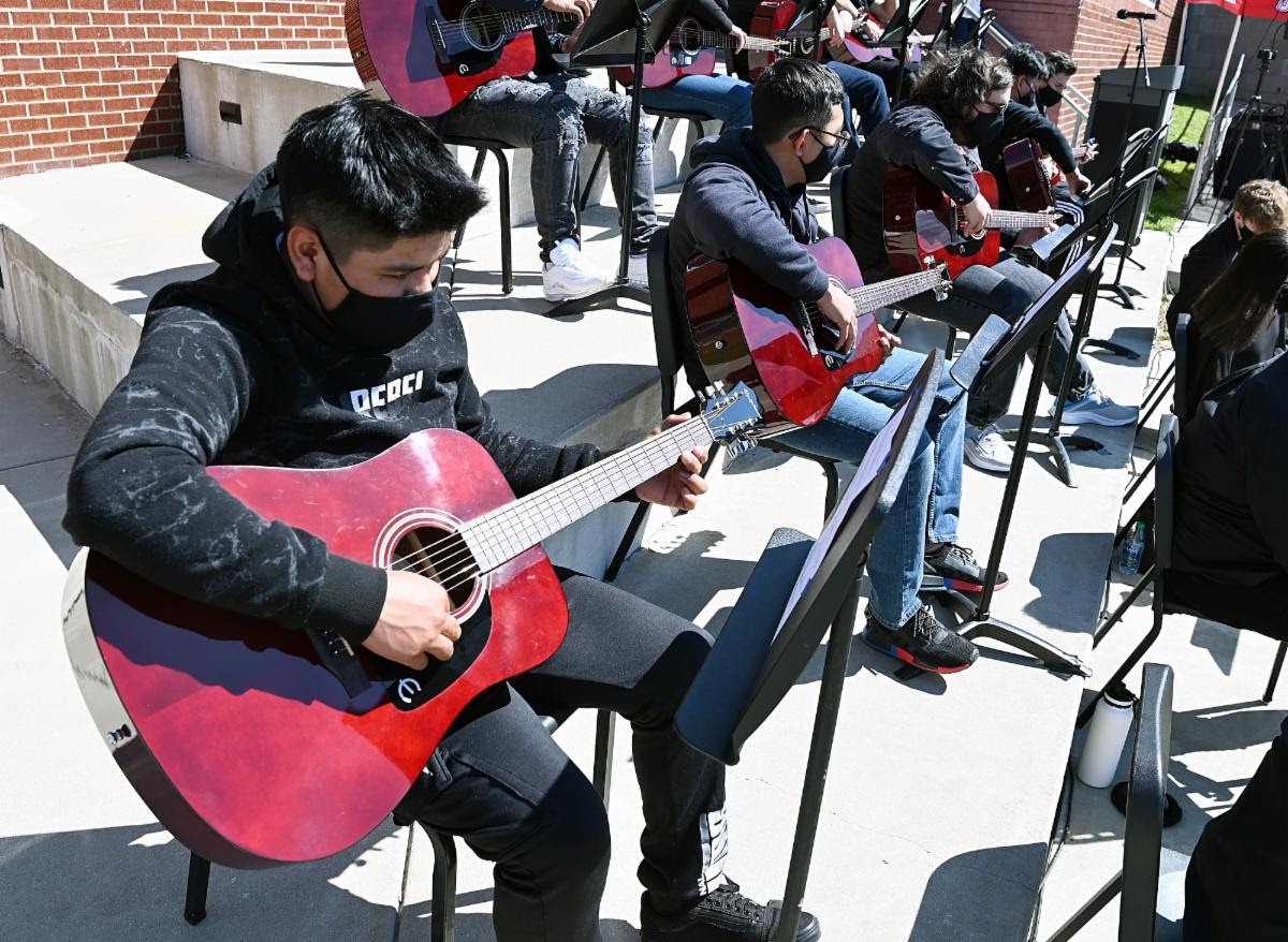 Above: John Overton High School students in Nashville, TN enjoy new Epiphone acoustic guitars in their music class