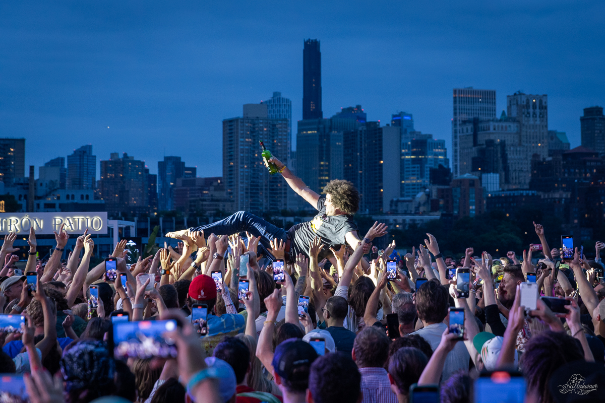 Andy Frasco crowd surfing against the Brooklyn sky line | Pier 17