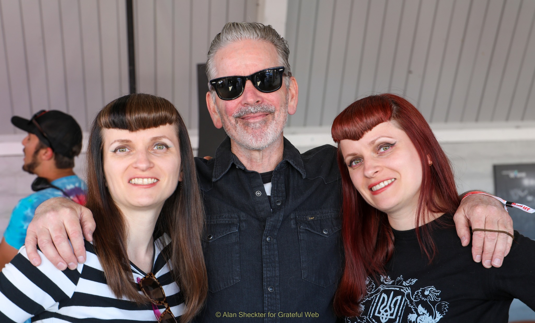 The Mad Twins – Olya and Vira – pose with their friend Jonny Two Bags of Social Distortion