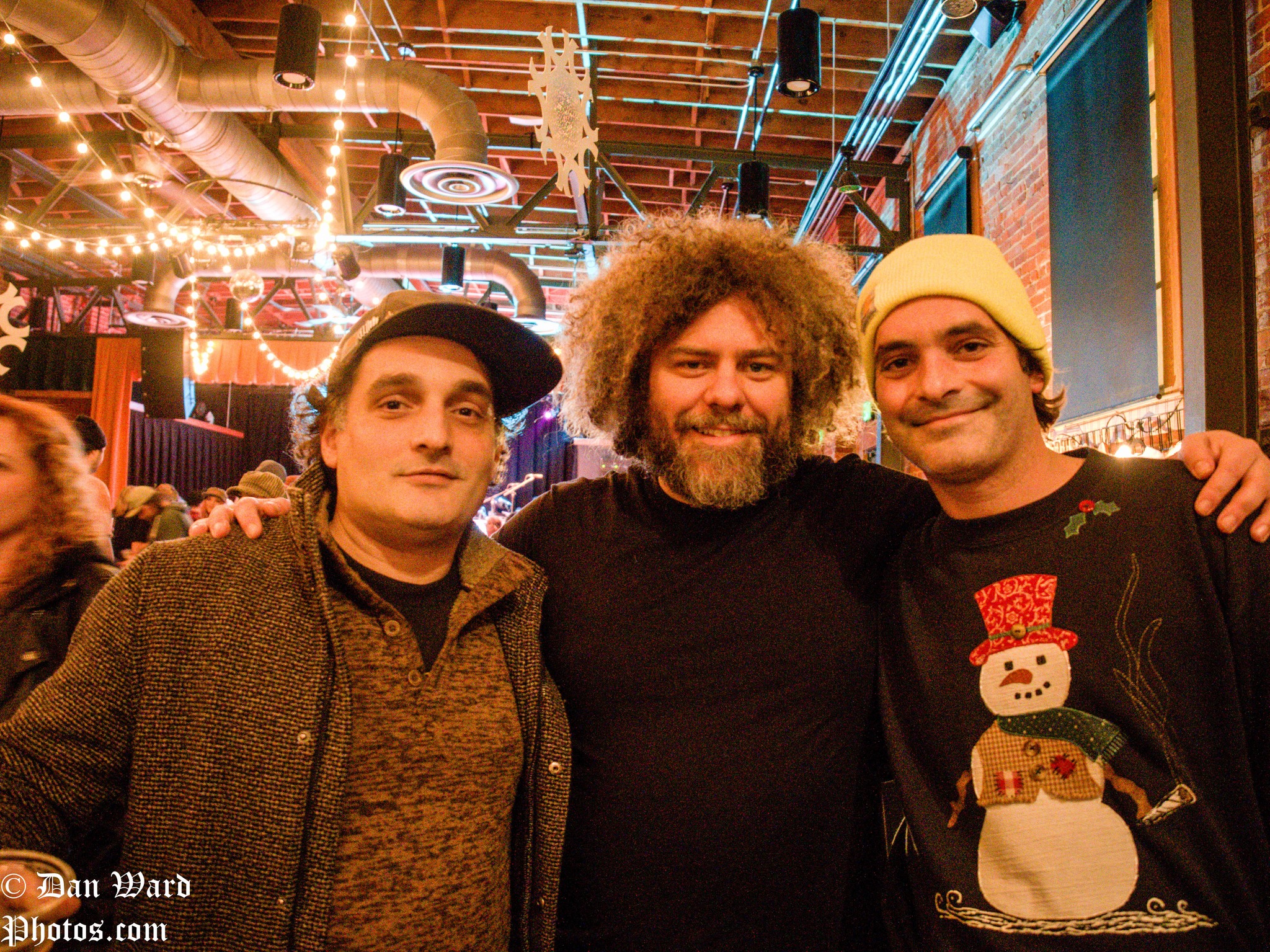 Neal “Fro” Evans (middle) with fans