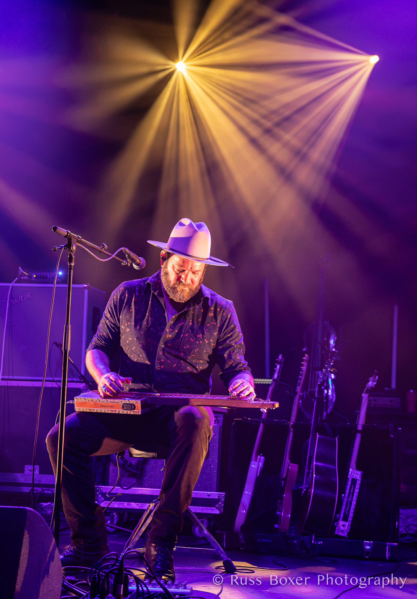 Cris Jacobs and his cigar box guitar | Photo by Russ Boxer