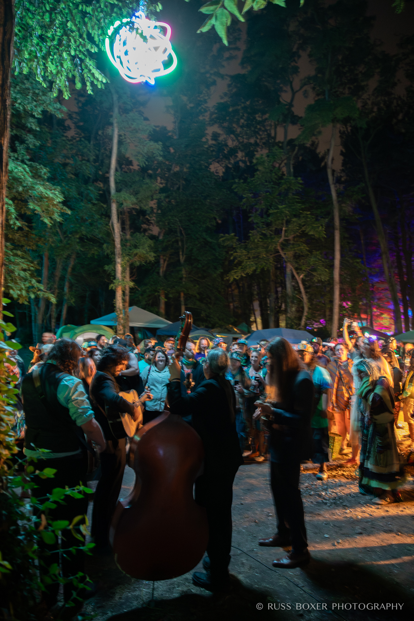 Henhouse Prowlers playing late night Saturday in the woods | Photo by Russ Boxer